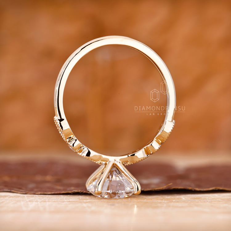 Custom engagement ring with round cut diamond.