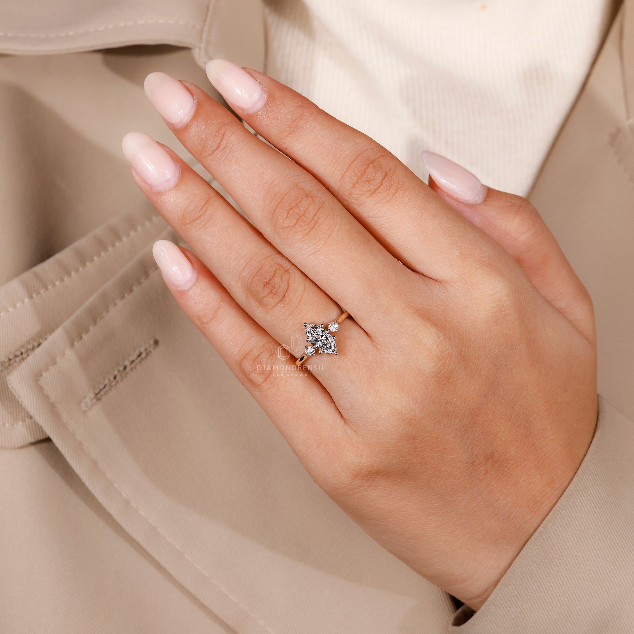 UK engagement ring with marquise and round diamonds