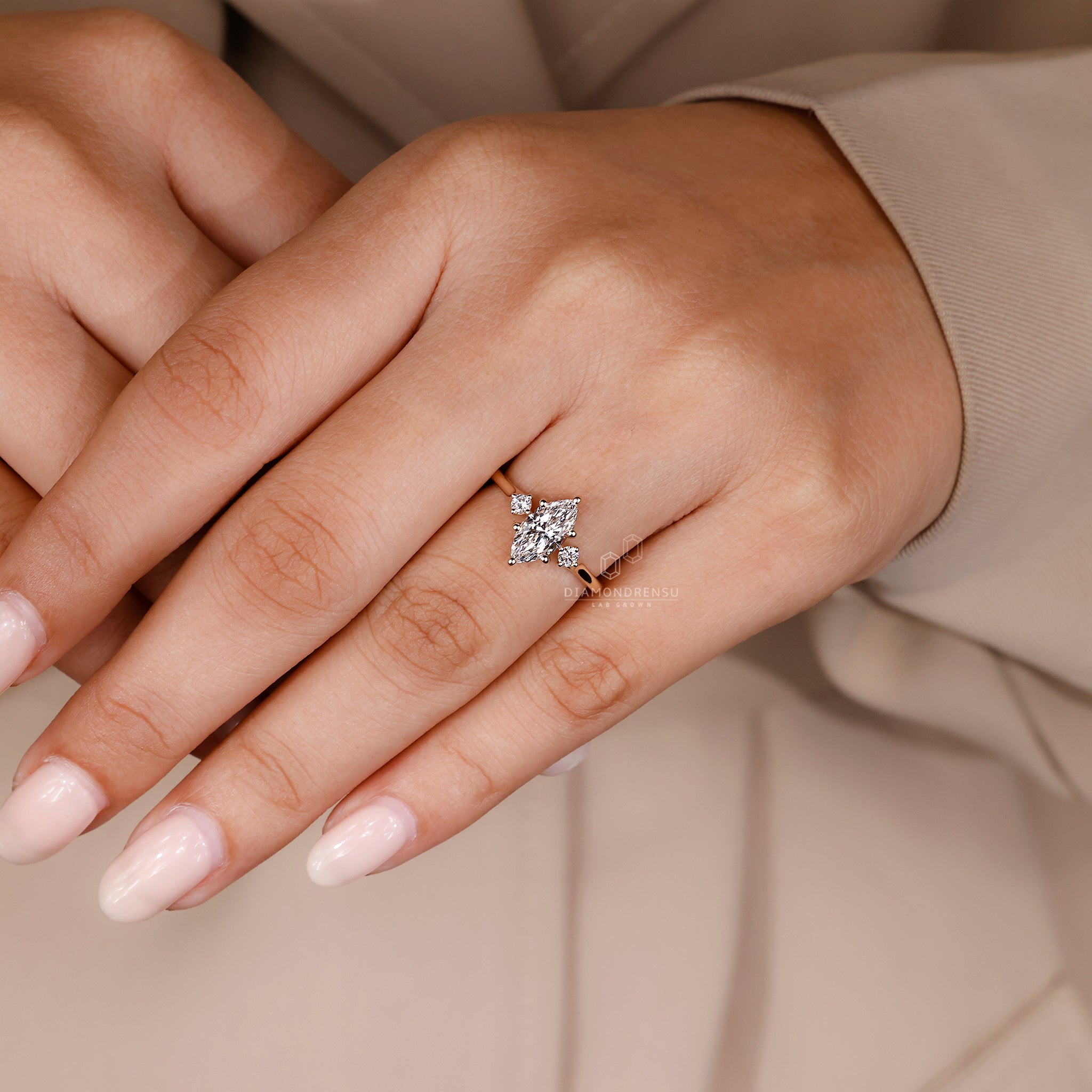 Lab grown marquise diamond ring with two side stones