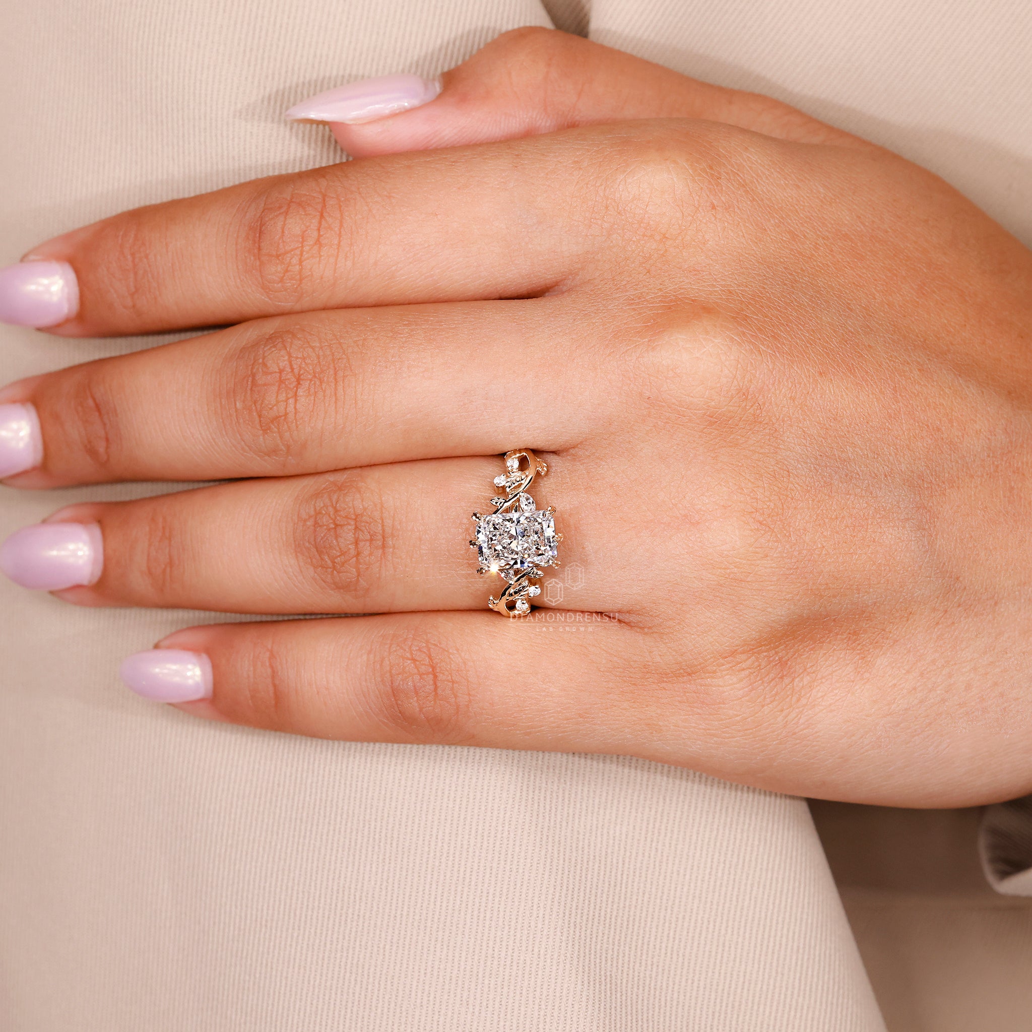 Yellow gold engagement ring with marquise and round accents