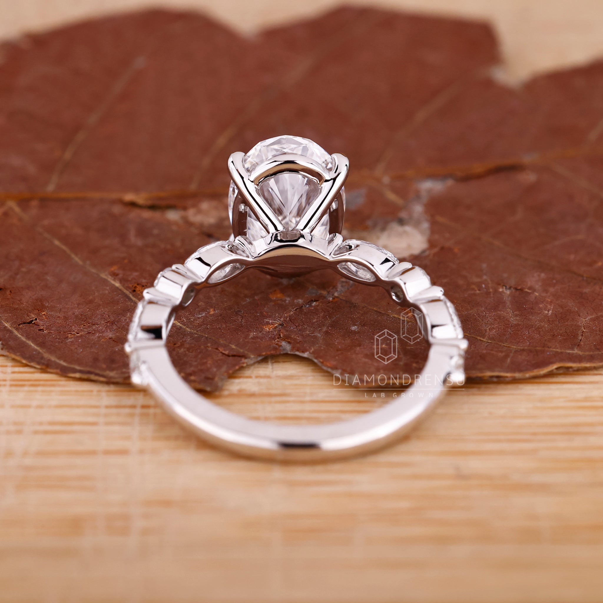 Lab grown diamond engagement ring in shared prong design