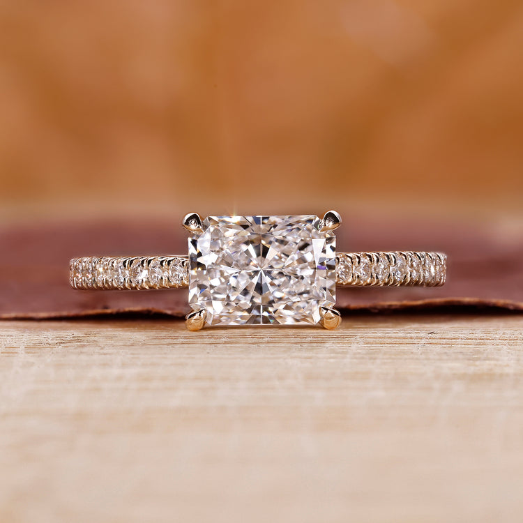 Radiant cut diamond engagement ring in yellow gold