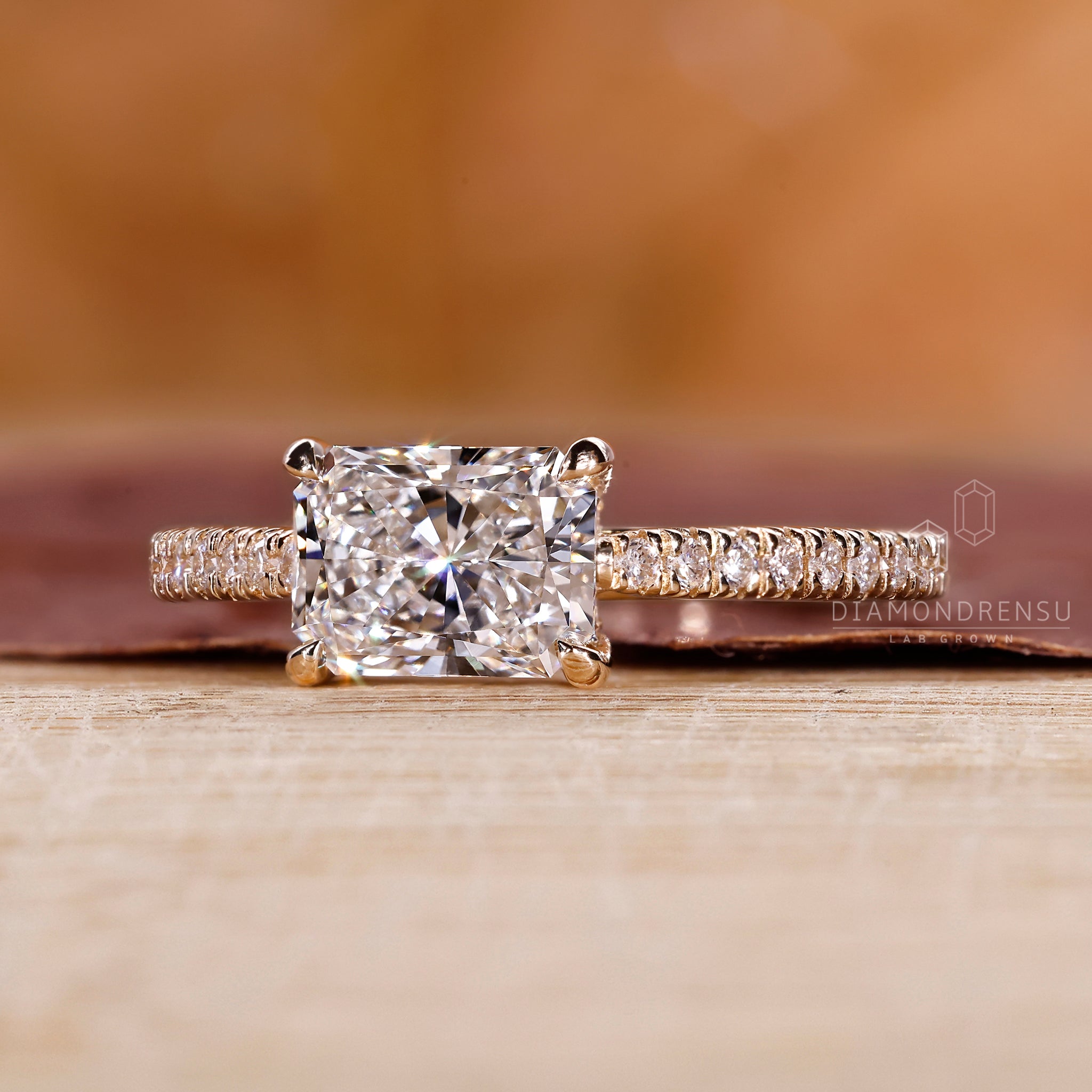 Unique east west engagement ring design