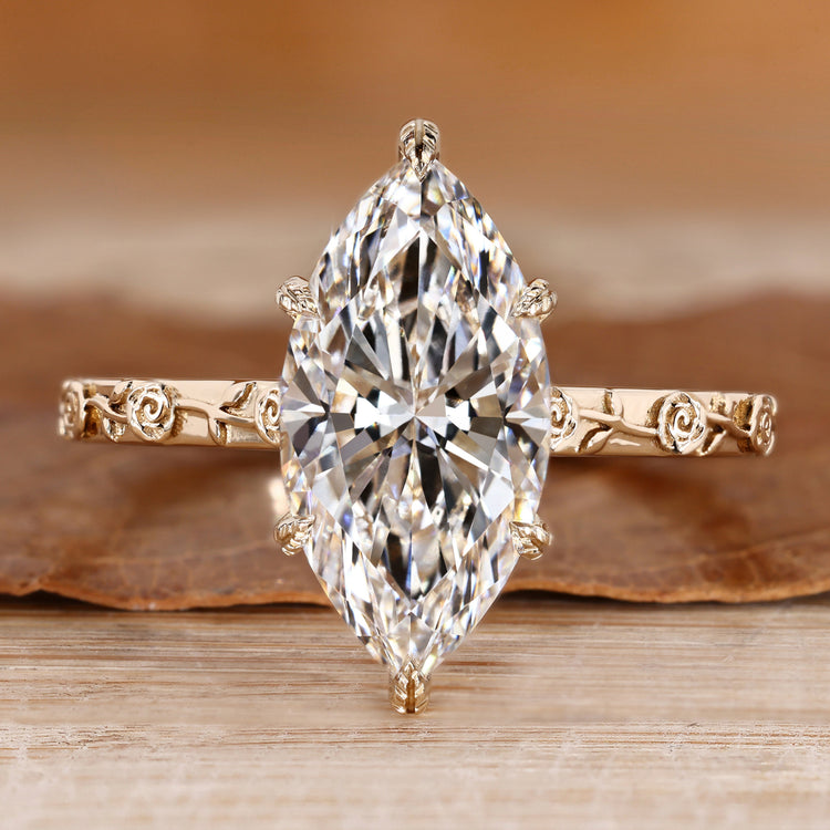 Marquise cut engagement ring with solitaire style.