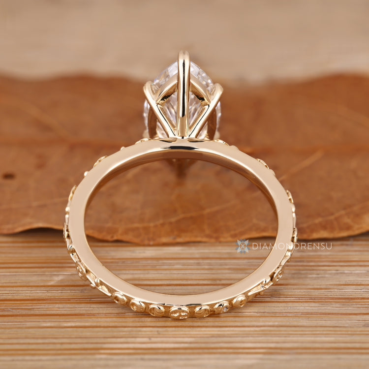 Handmade marquise ring with solitaire and art deco style.