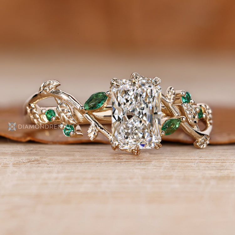 Handmade radiant cut ring with six leaf prong setting.