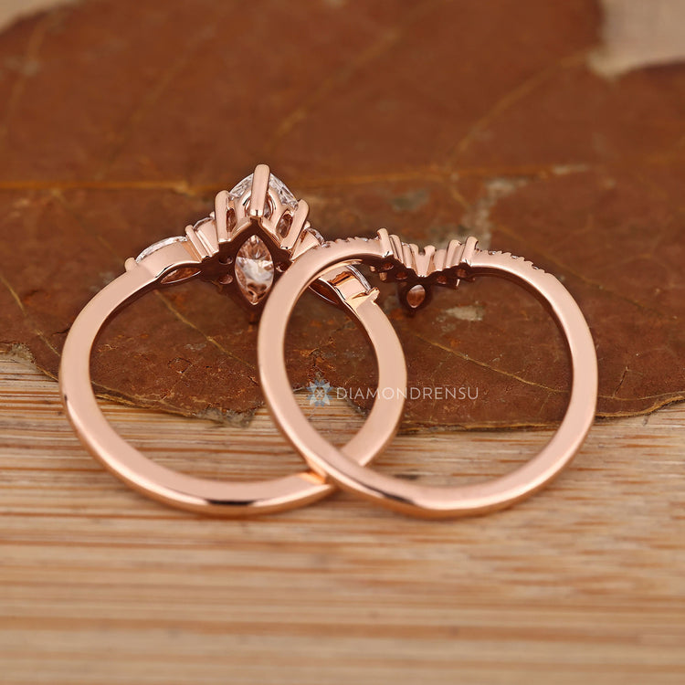 Marquise and round diamond band with muse setting.