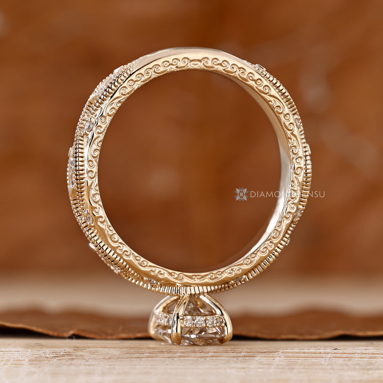 Oval cut lab grown diamond ring with vintage style.