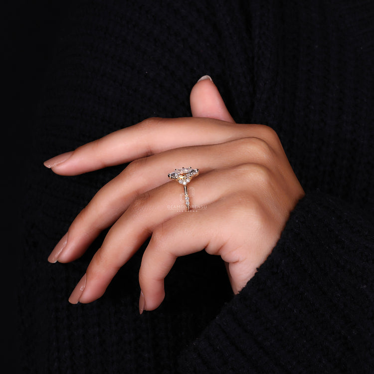 Lab grown dutch marquise ring with round side stones.