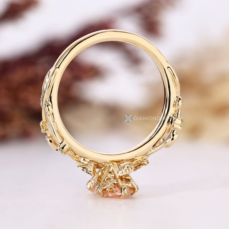 Marquise cut diamond ring with nature inspired design.