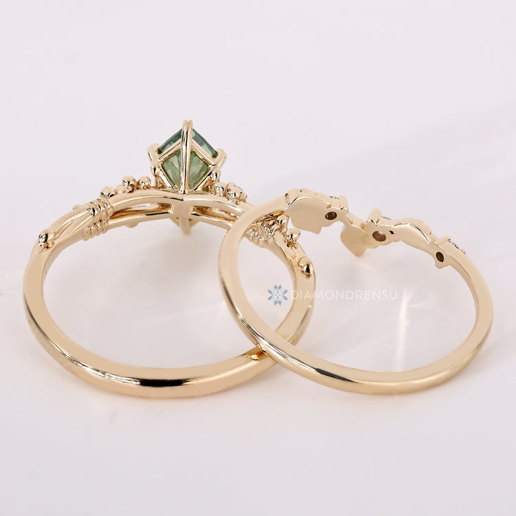 Bridal set with round side stones and split shank.