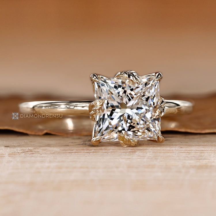 Lab grown princess cut diamond ring with tulip setting.