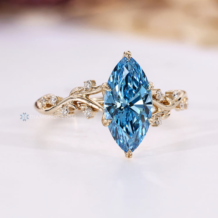 Handmade blue diamond ring with nature inspired style