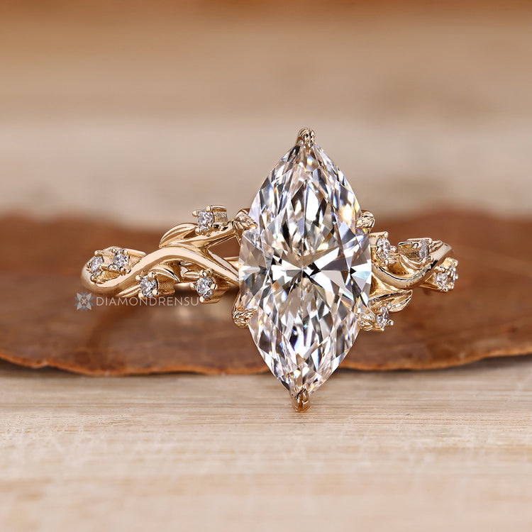 Handmade marquise ring with tulip setting.