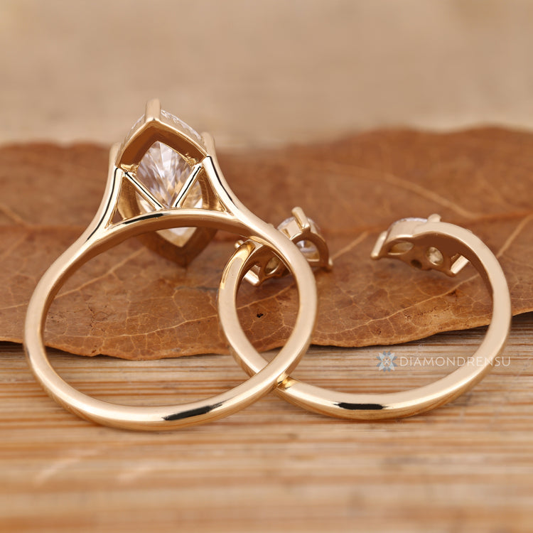 Round pear and marquise diamond band for bridal sets.