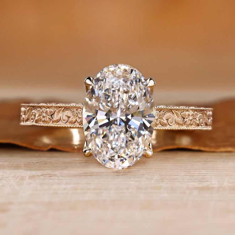 Oval cut diamond ring with art deco style.