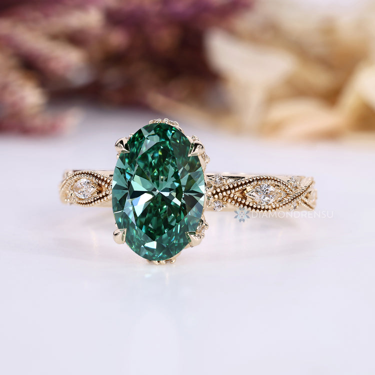 Lab grown diamond ring with marquise side stones.