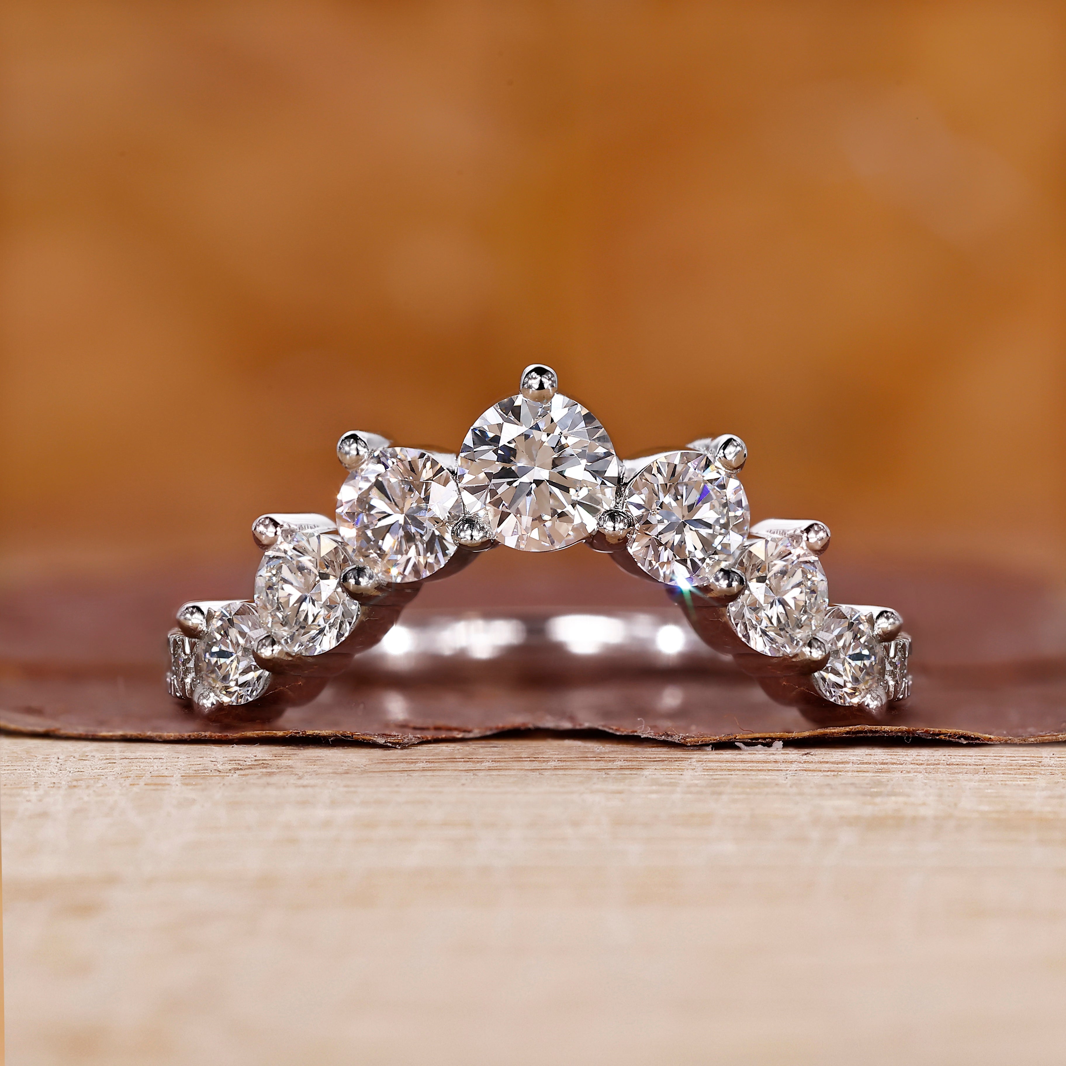 U shaped wedding band crafted in white gold with a clean design.
