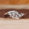 East to west setting ring with marquise diamond.