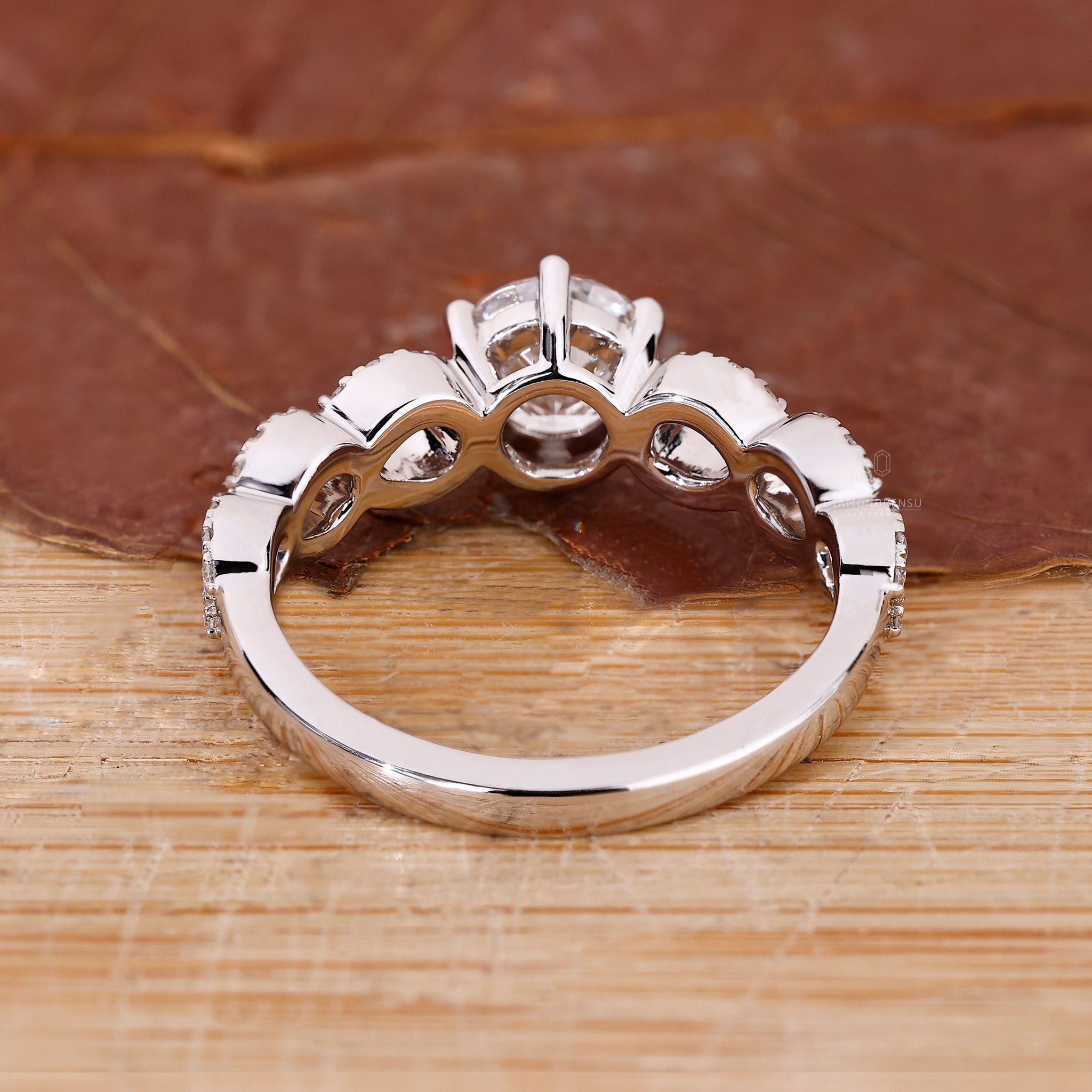 Handmade ring with round cut diamond in a secure 6 prong setting.