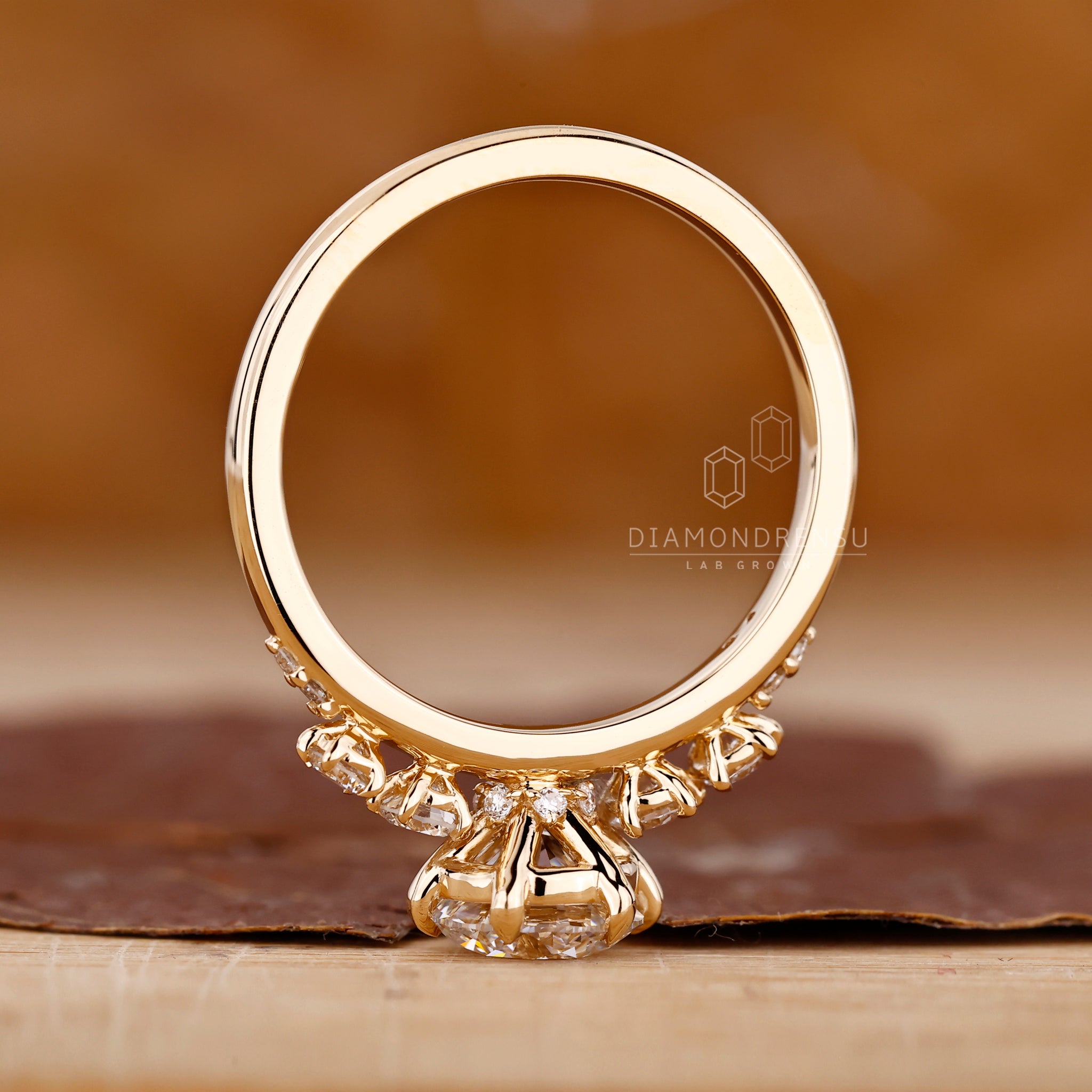 Round Diamond Side Stone placed beside the main diamond.