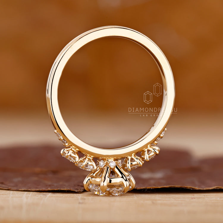 Round Diamond Side Stone placed beside the main diamond.