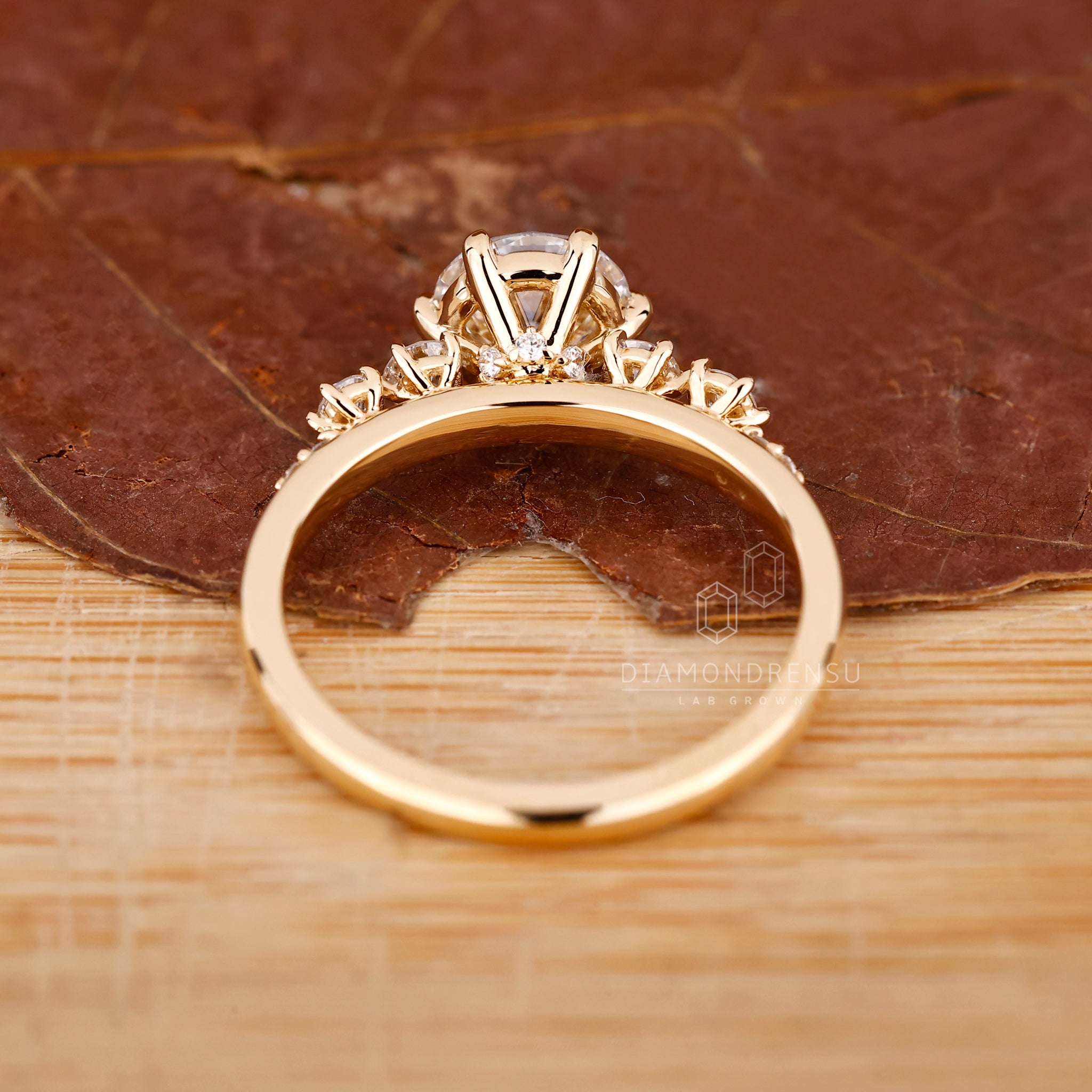 Side stone engagement ring made in lab grown diamond design.