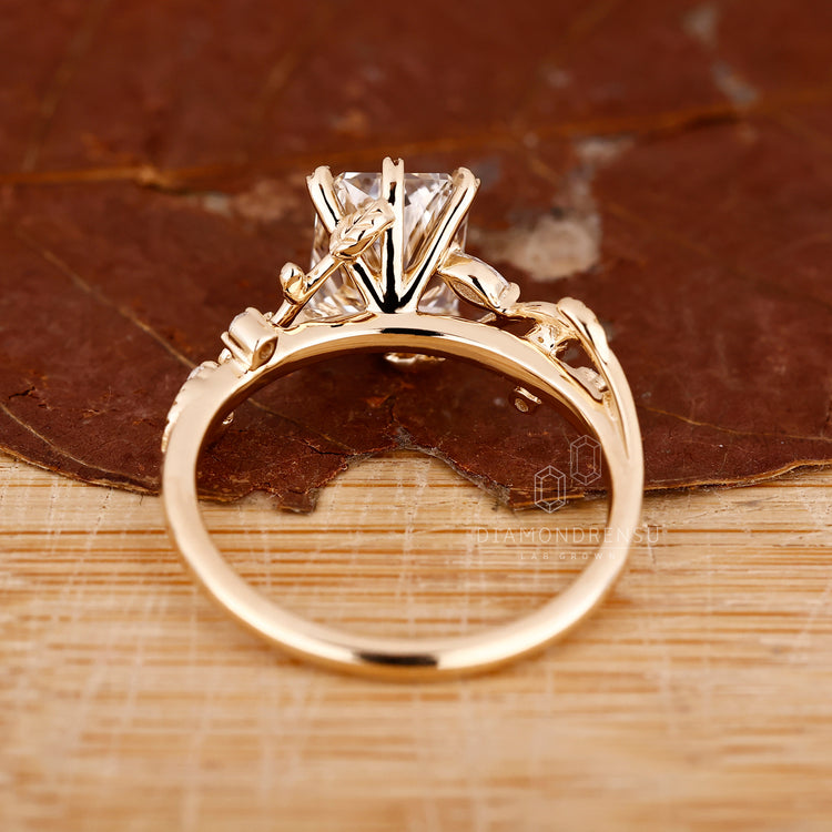 Handmade radiant cut ring with leaf-inspired prongs
