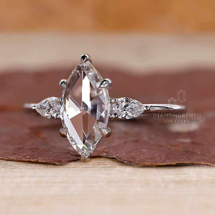 IGI certified diamond included in three diamond ring style.