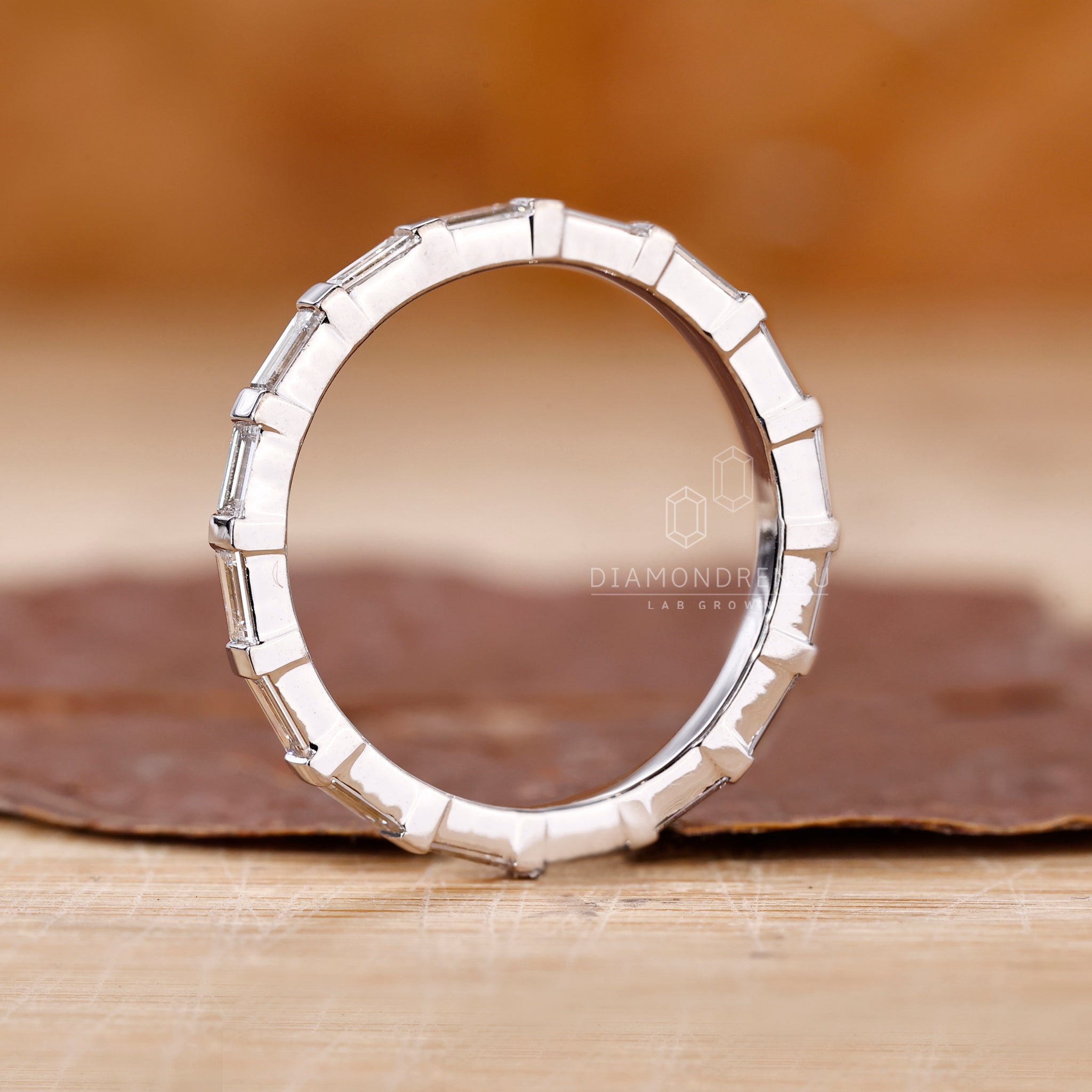 Lab Grown Diamond wedding band with white gold bar setting.