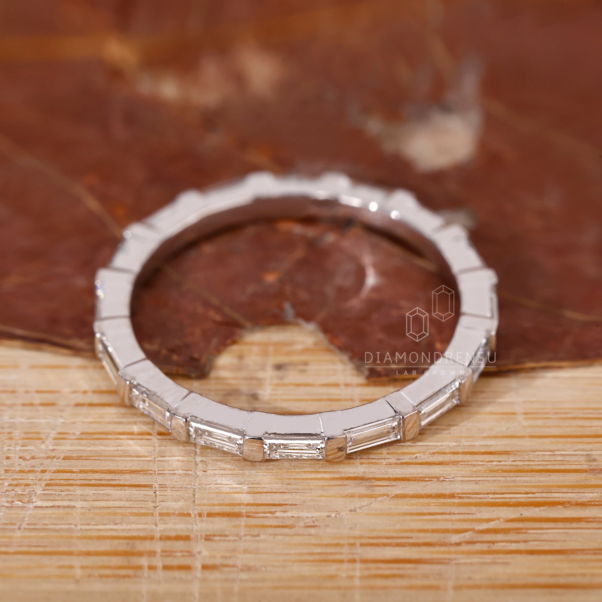 Handmade jewellery crafted in white gold with baguette diamonds.