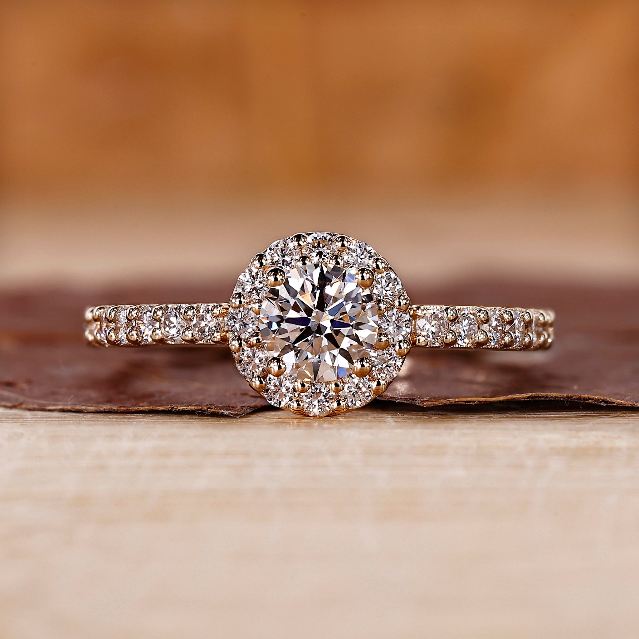 Diamond Halo Ring with round cut diamond center.
