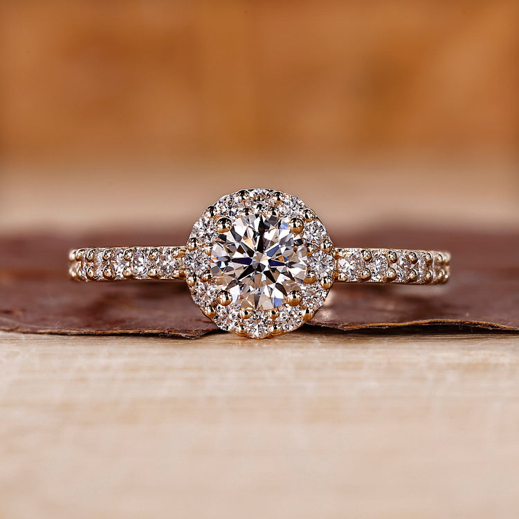 Diamond Halo Ring with round cut diamond center.
