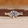 Nature inspired engagement ring with twisted pave band.