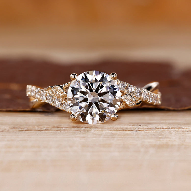 Nature inspired engagement ring with twisted pave band.