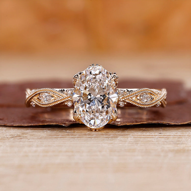 Oval cut diamond ring crafted in yellow gold ring.