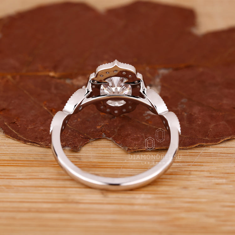 UK engagement ring with marquise halo outline.