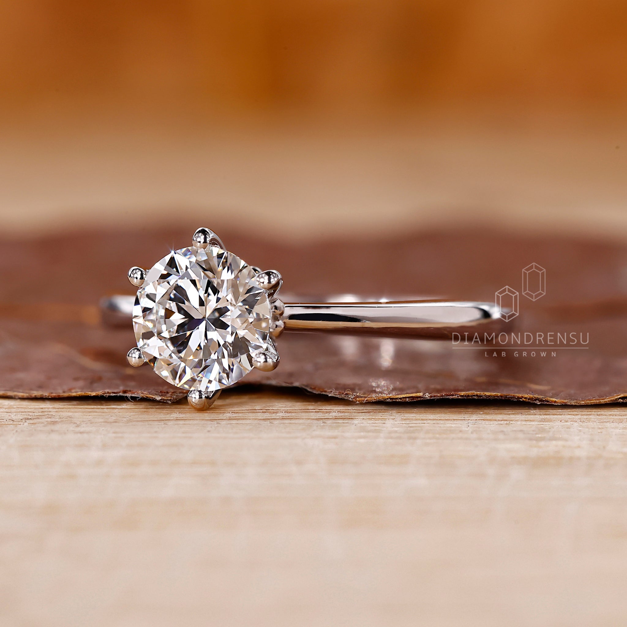 Round cut lab diamond ring in solitaire setting