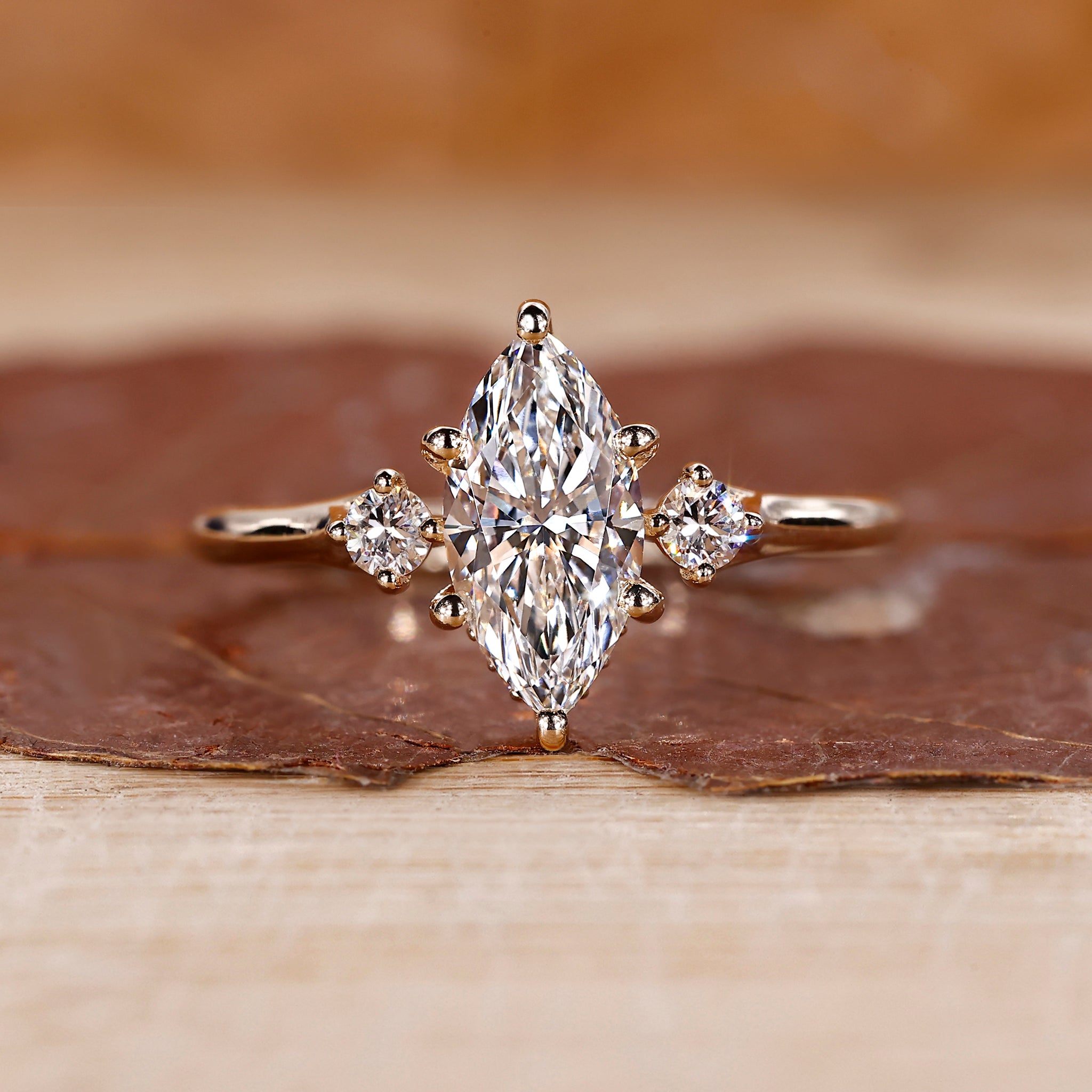 Marquise diamond engagement ring in yellow gold