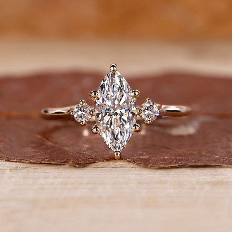 Marquise diamond engagement ring in yellow gold
