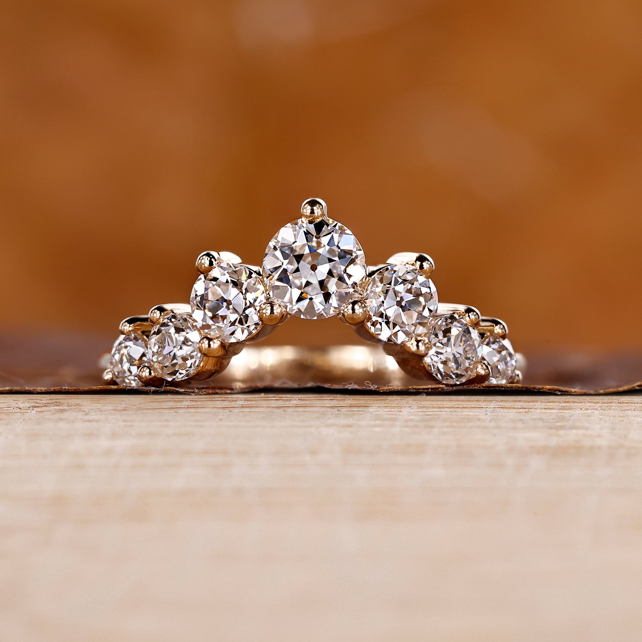 7 stone wedding band with round old European cuts.