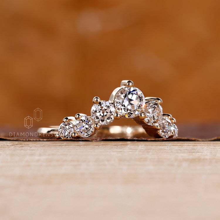 U shaped wedding band crafted in yellow gold.