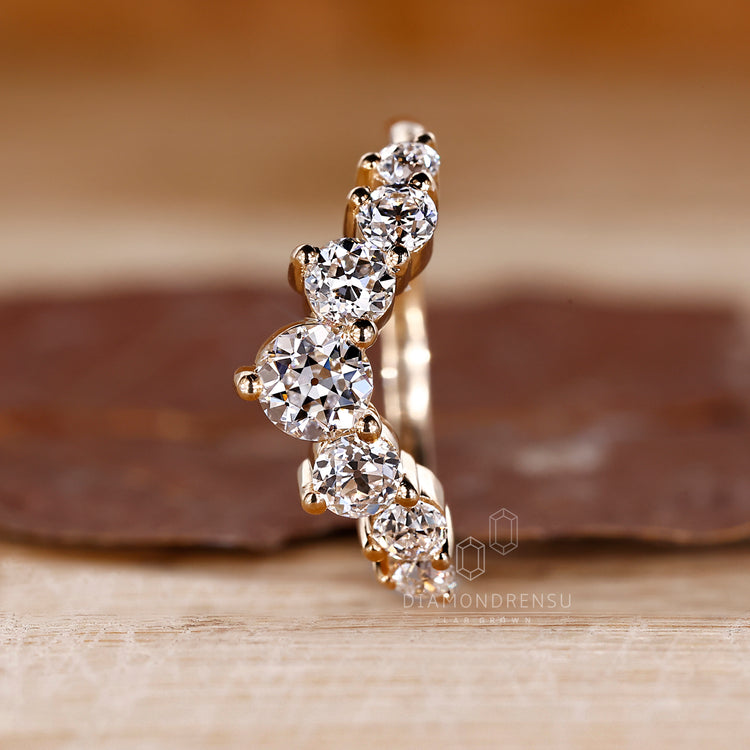 Buy diamond band with old European cut design.