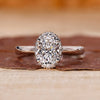 Oval cut diamond ring with halo setting