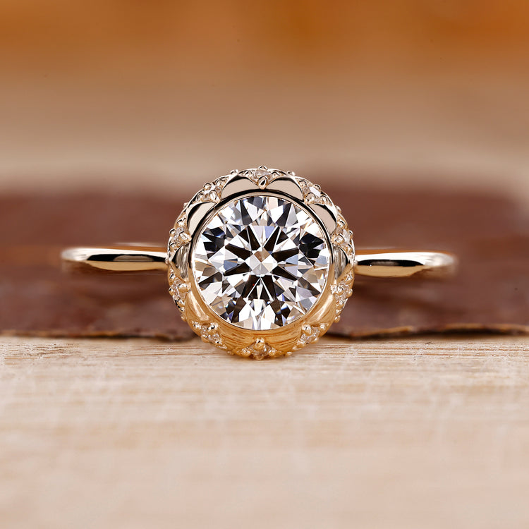 Vintage diamond engagement ring with bezel setting