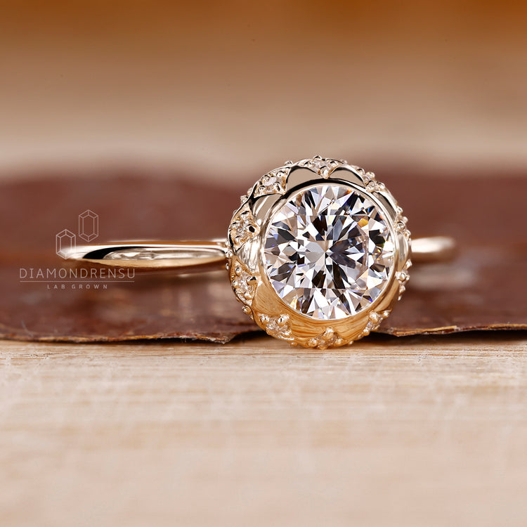 Elegant bezel set diamond ring with hidden round diamond