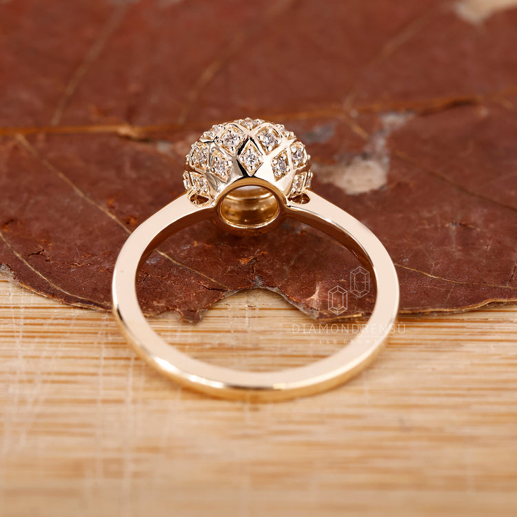 Classic solitaire engagement ring with vintage style band