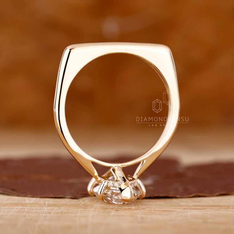 Diamondrensu UK engagement ring with cathedral setting.