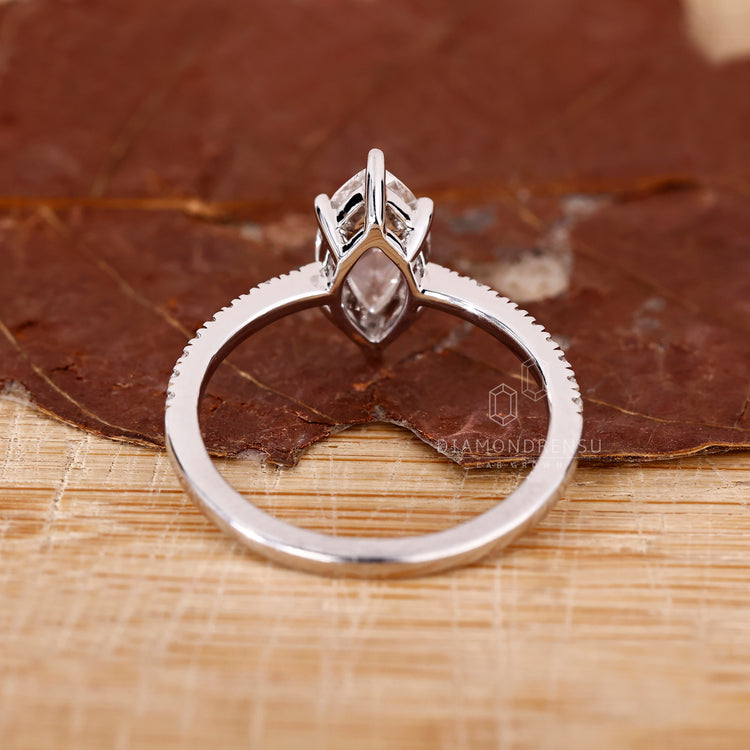 Buy diamond ring with tapered shank and pave band.