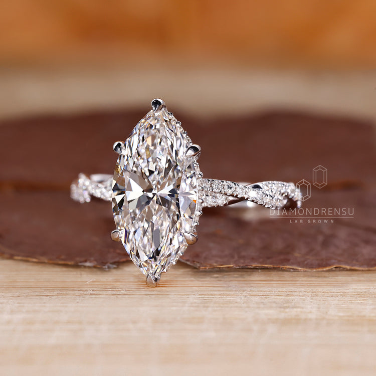 Round cut twisted pave design in a custom setting.